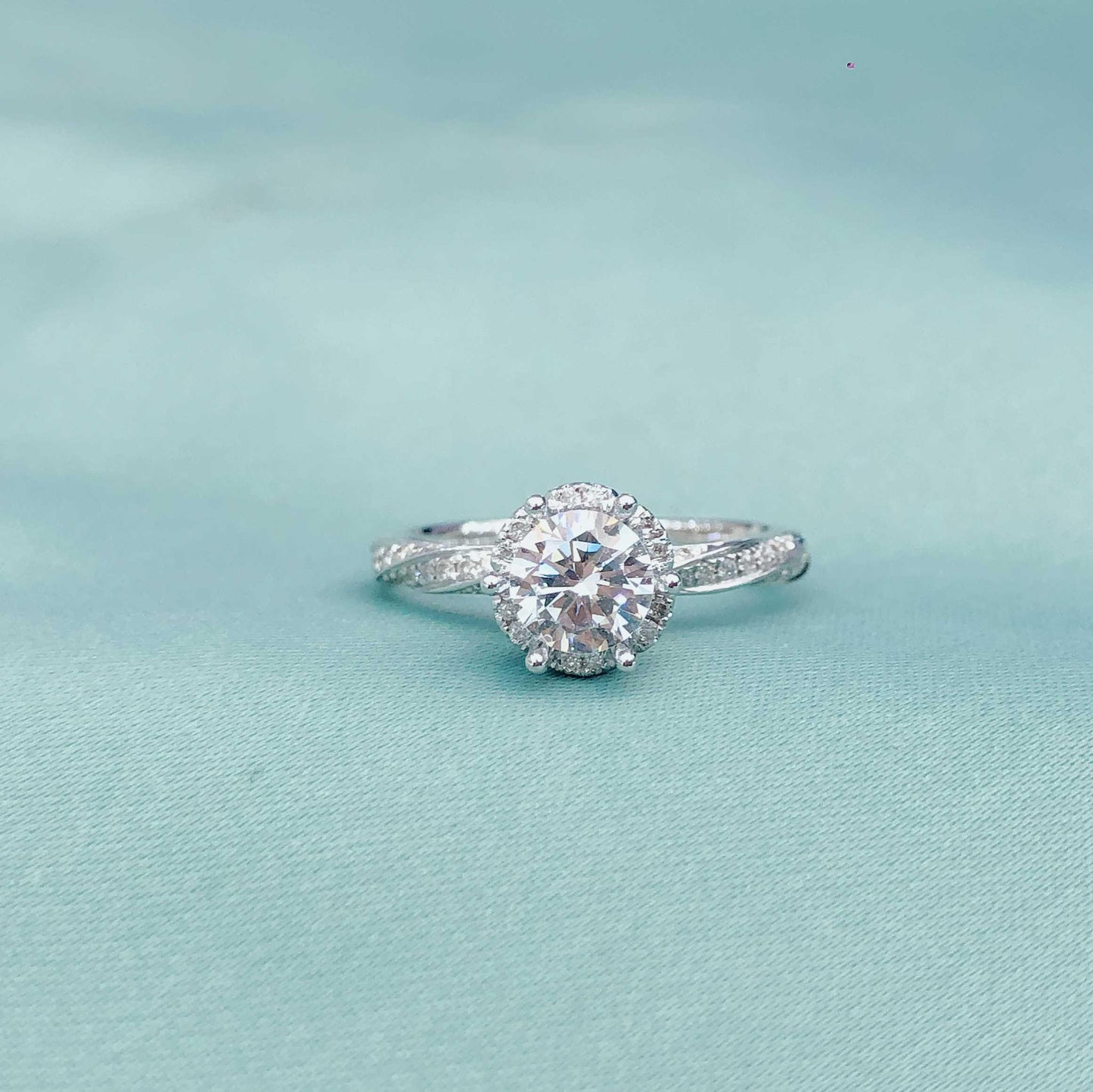 Glacial Muse – 18K White Gold Three-Stone Ring with 2ct Center & Diamond Pavé