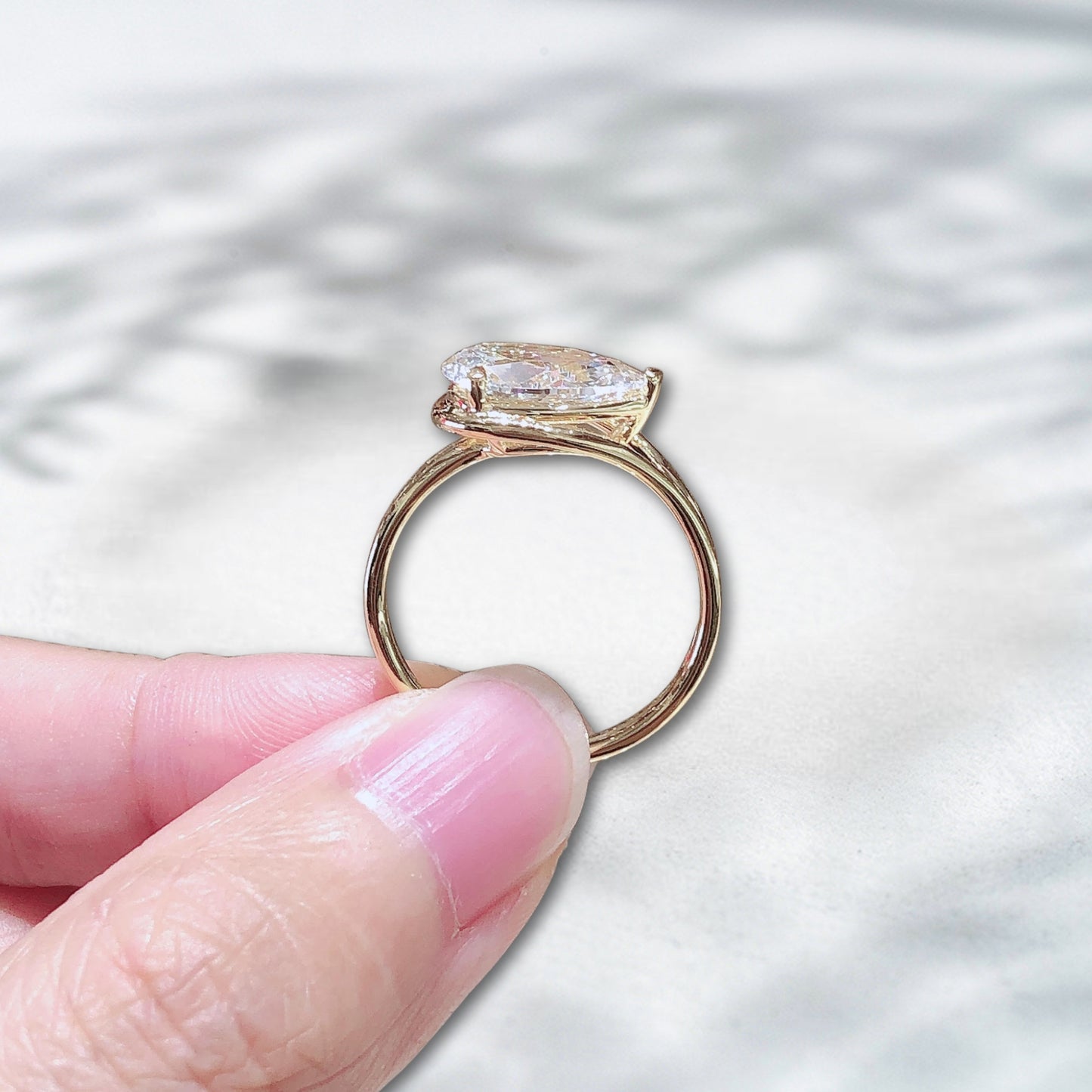 The Crowned Drop – Pear Cut Solitaire in 18K Yellow Gold