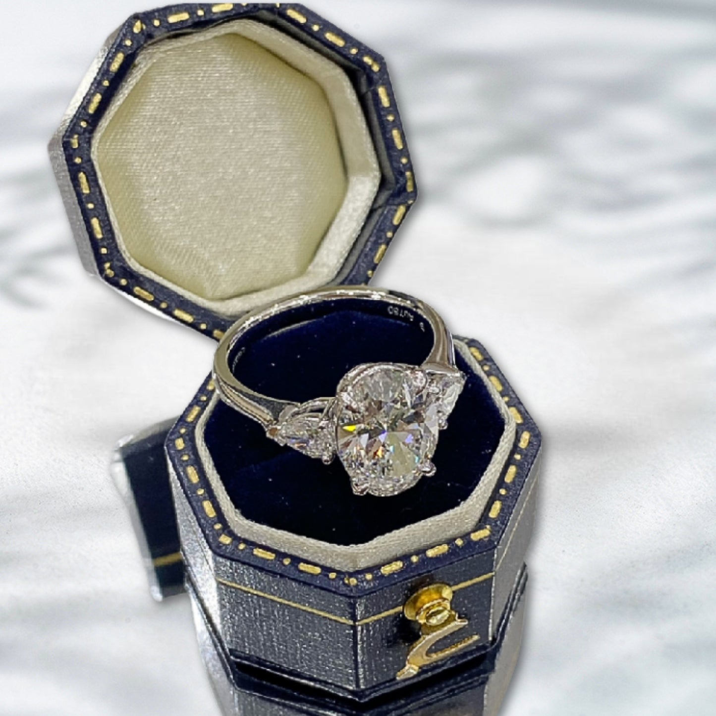 QOB Emerald Allure 2.043ct Oval Cut Lab Diamond Ring with Tapered Baguette Side Stones in 18K White Gold
