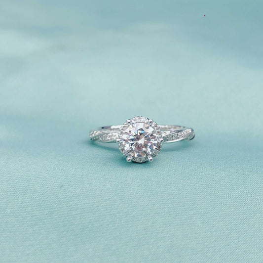 Glacial Muse – 18K White Gold Three-Stone Ring with 2ct Center & Diamond Pavé