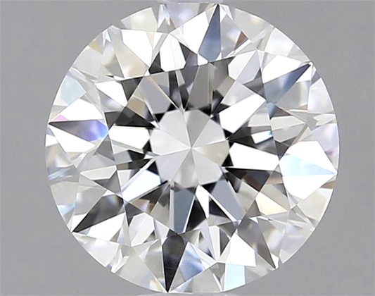 Close-up of a round diamond with a gray background