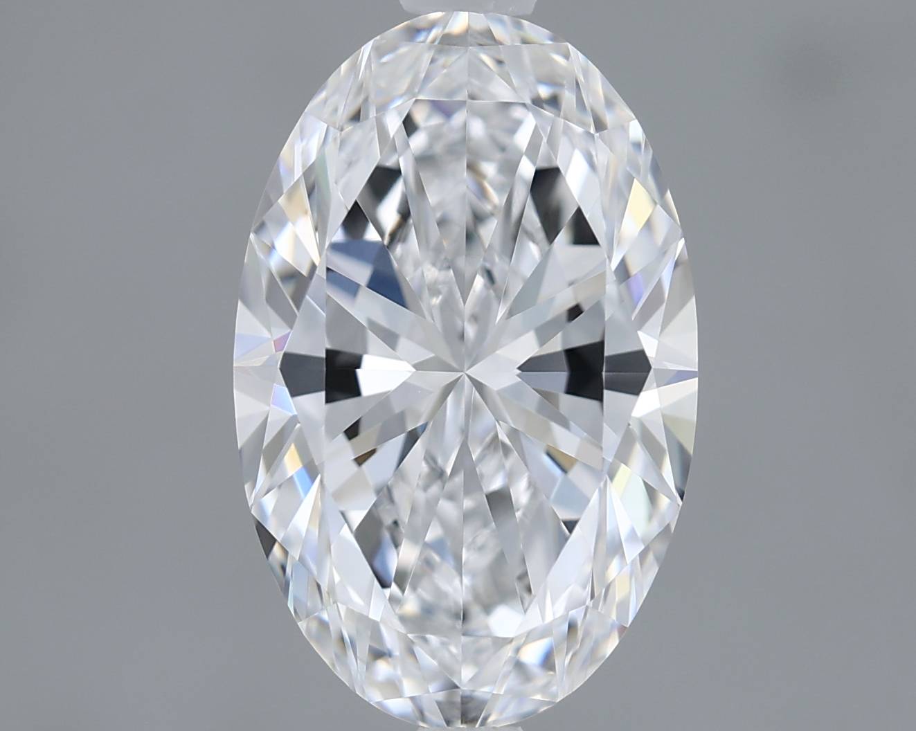 Oval-shaped diamond on a gray background