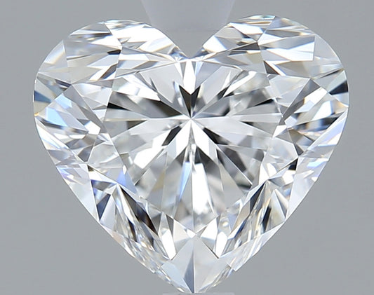 Heart-shaped diamond on a gray background