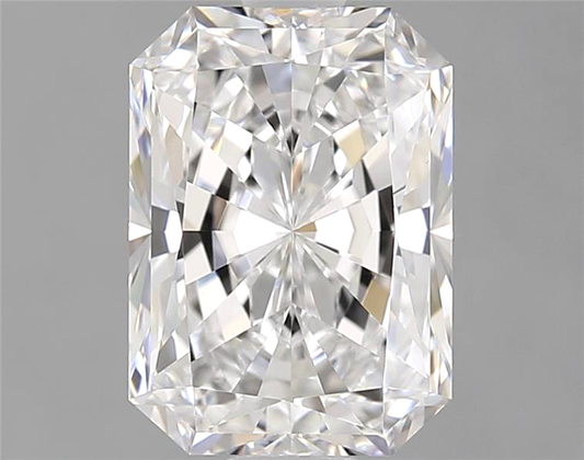 Radiant cut diamond on a gray background