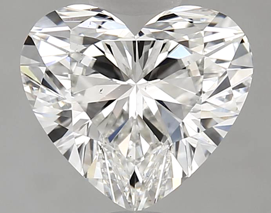 Heart-shaped diamond on a gray background