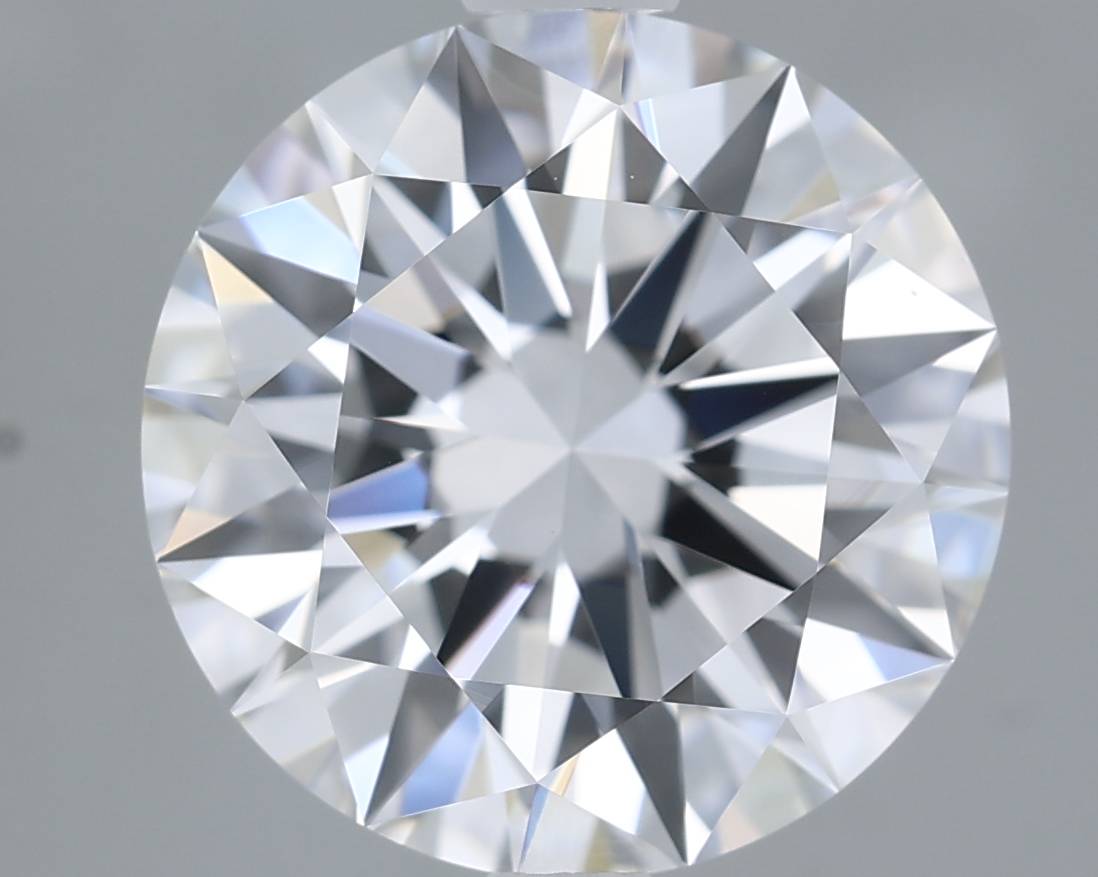 Close-up of a round diamond with a gray background