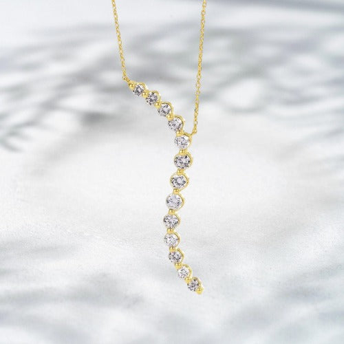 Golden Drift – 18K Natural Diamond Curve Pendant Necklace
