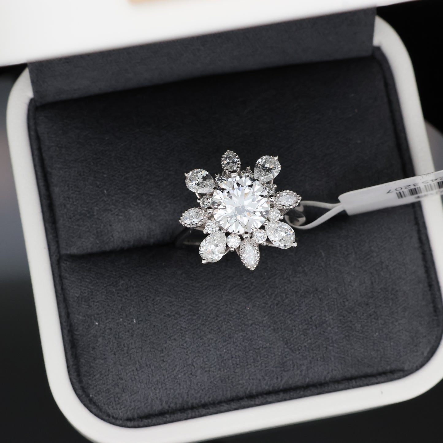 Diamond ring in a jewelry box on a black background