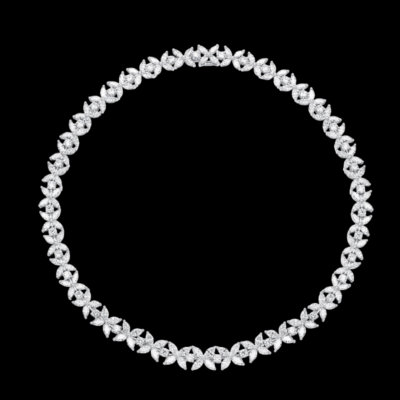 Silver necklace with clear stones on a black background