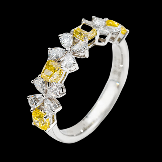 Silver ring with yellow and clear gemstones