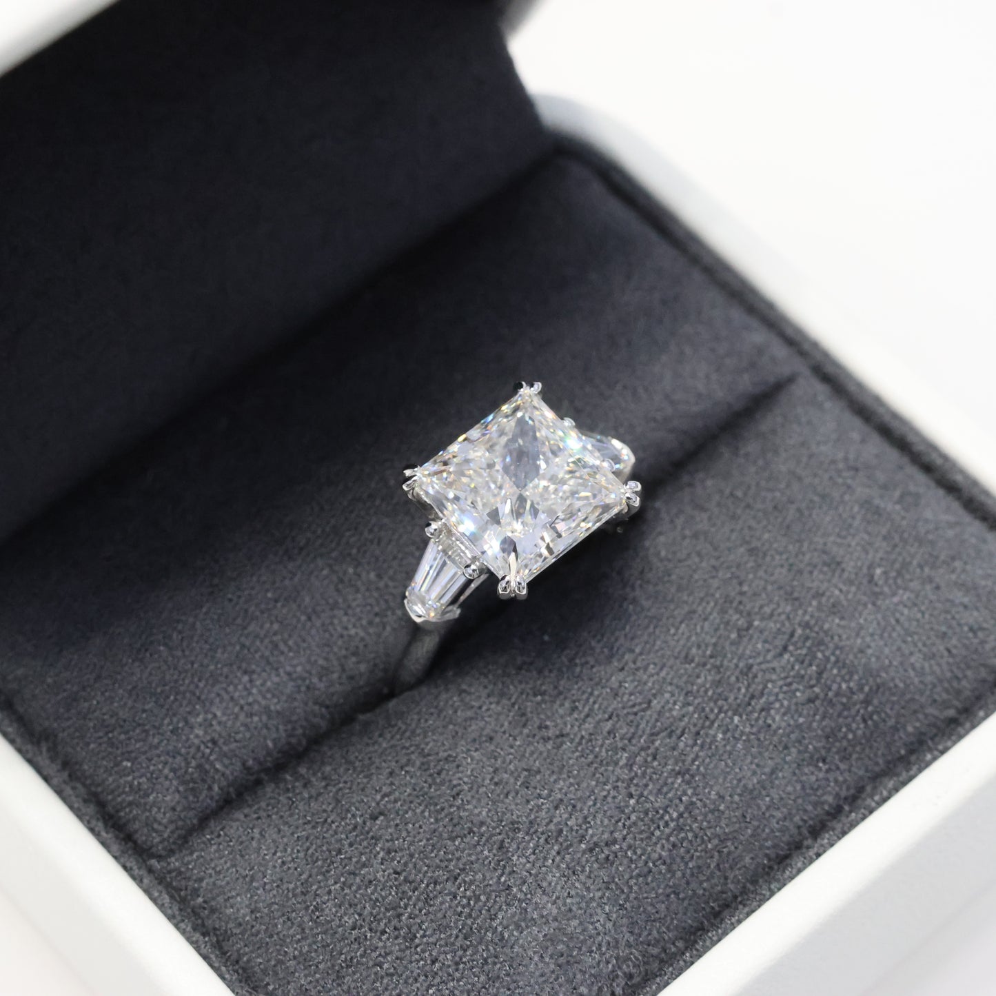 Diamond ring in a black jewelry box