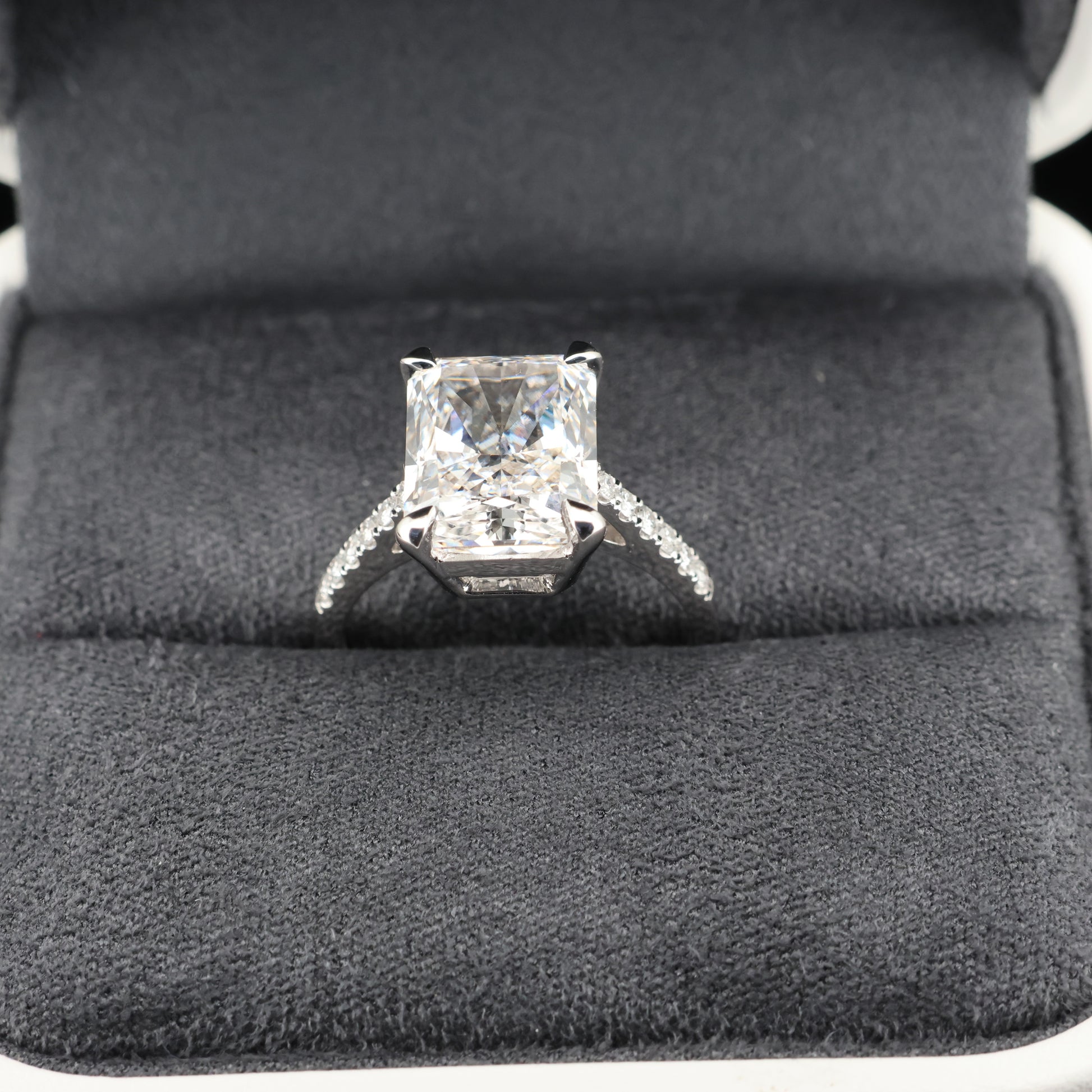 Diamond ring in a black jewelry box