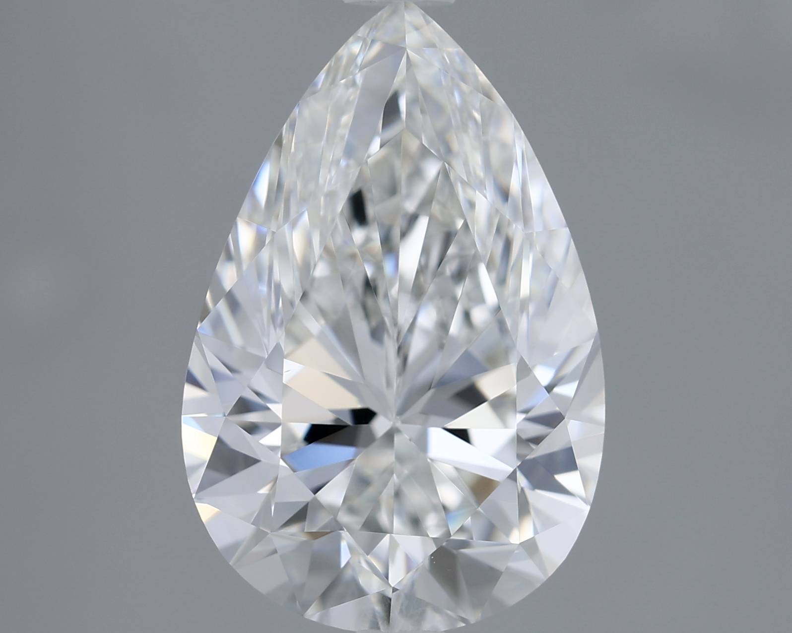 Pear-shaped diamond on a gray background