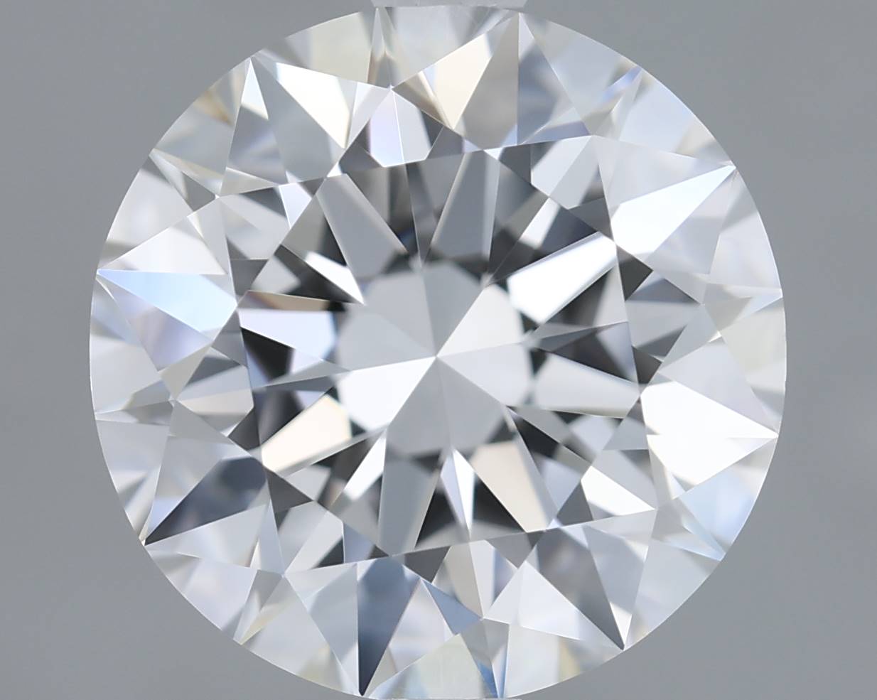 Close-up of a round diamond on a gray background