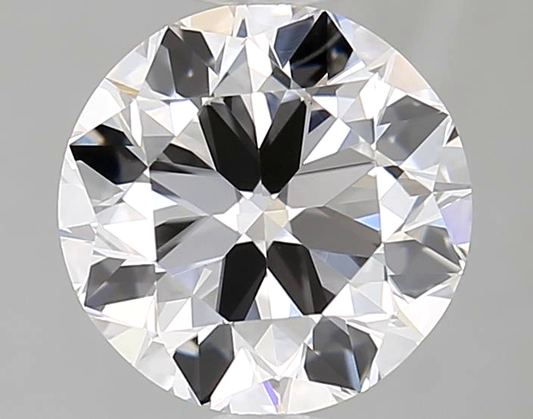 Round cut diamond on a gray background