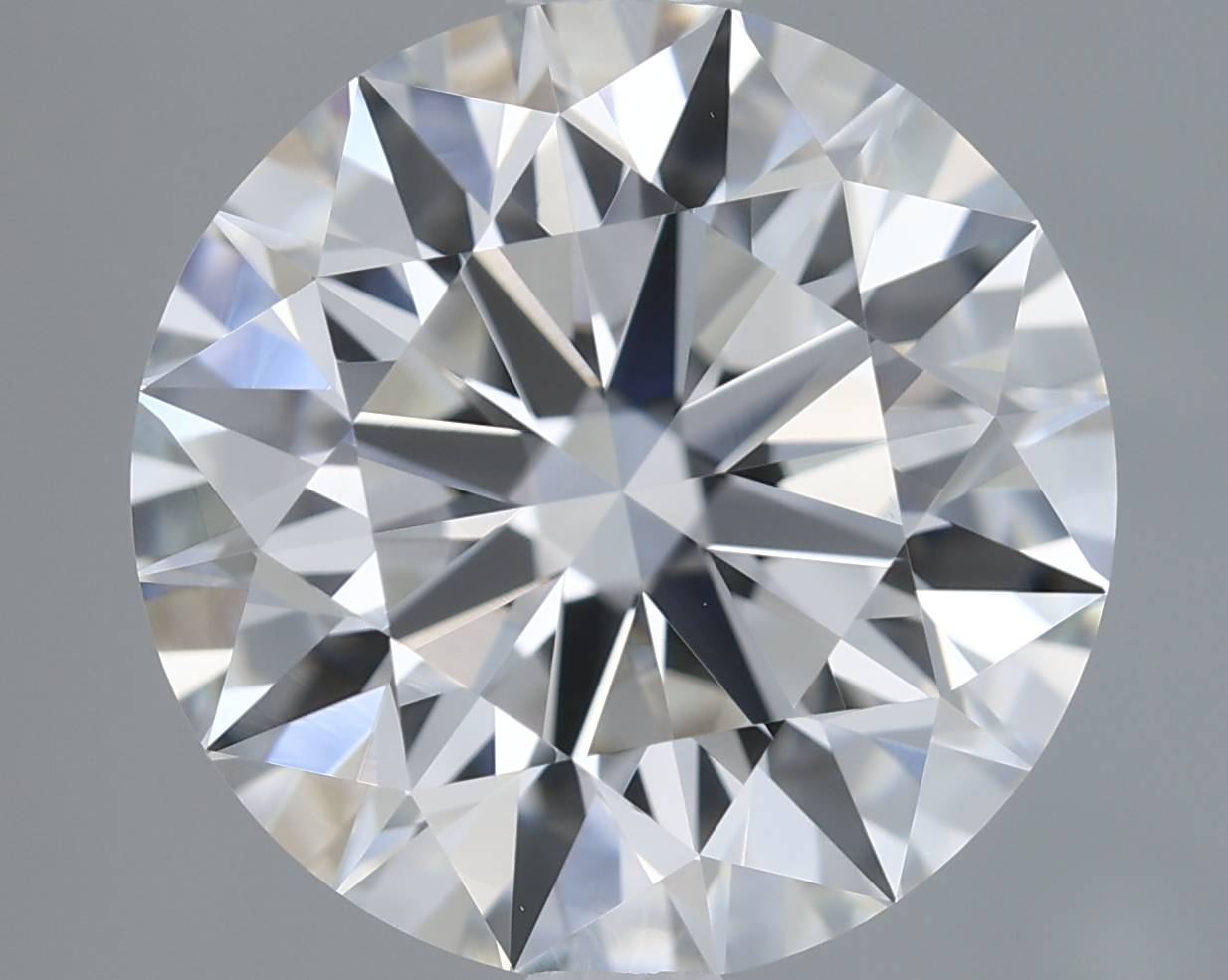 Close-up of a round diamond with a gray background