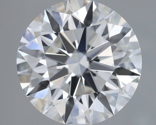Close-up of a round diamond with a gray background