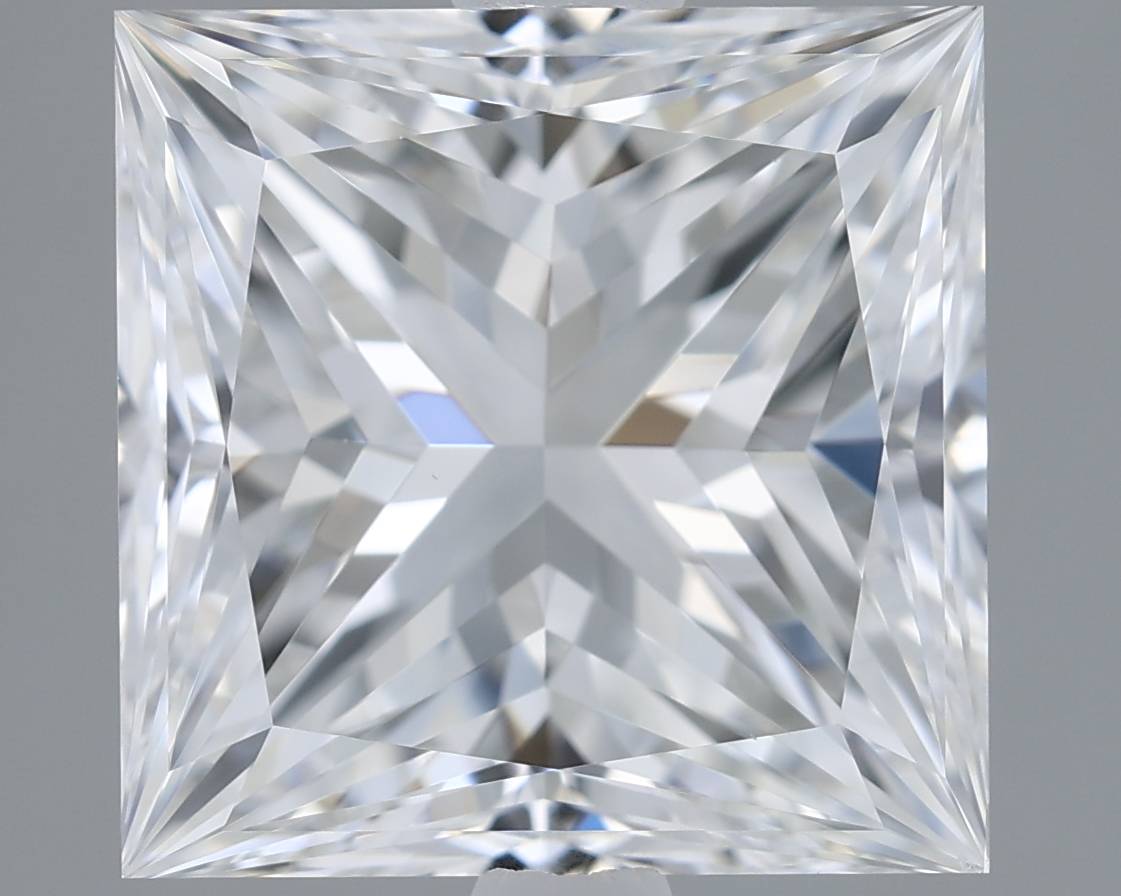 Close-up of a clear diamond with a gray background