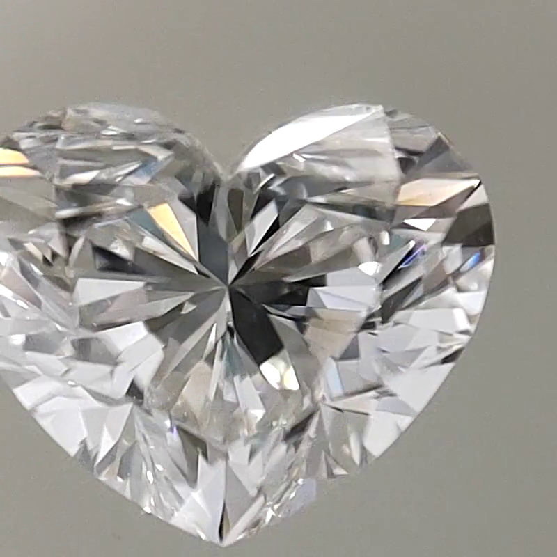 Heart-shaped diamond on a gray background