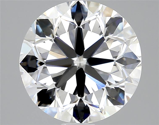 Close-up of a round diamond with a gray background