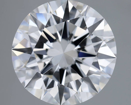 Close-up of a round diamond with a gray background