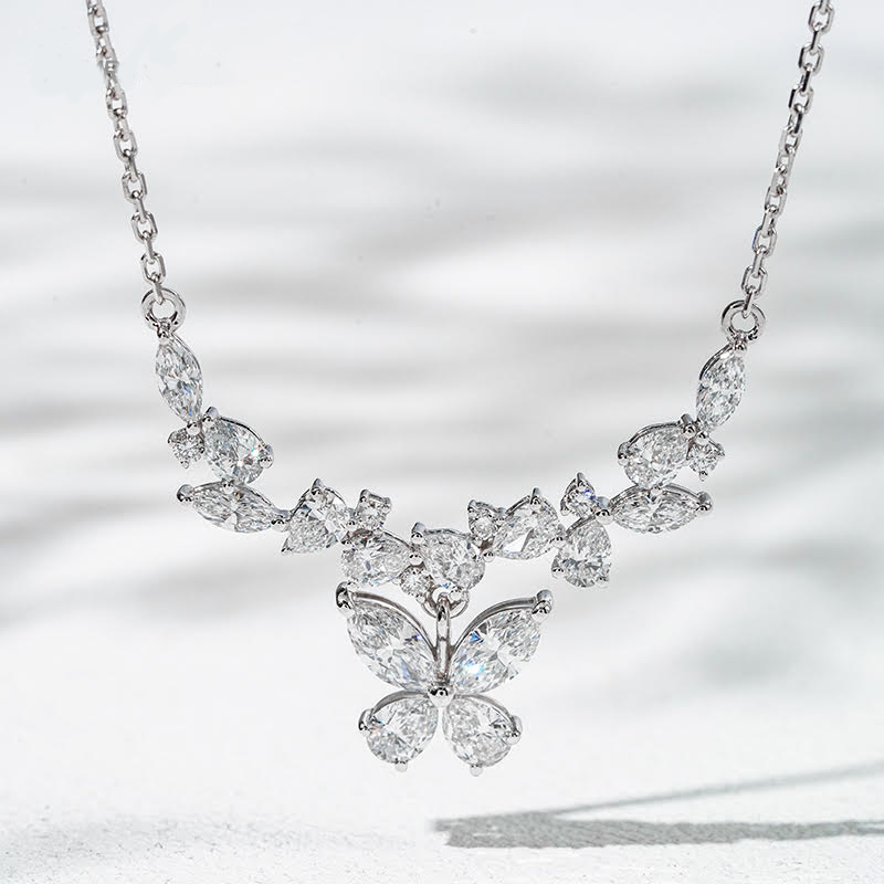 Diamond necklace with a butterfly design on a light background