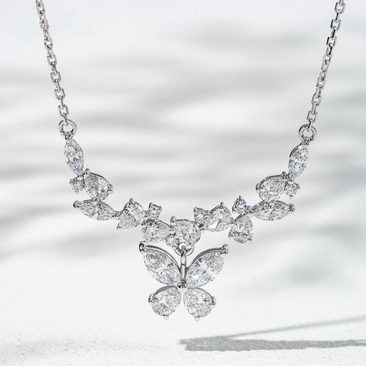 Diamond necklace with a butterfly design on a light background