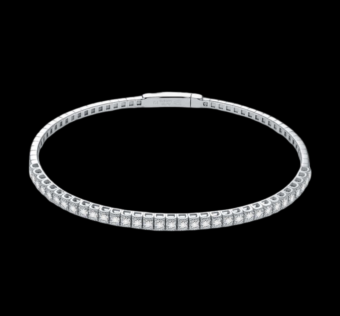 Silver bracelet with clear stones on a black background