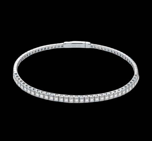 Silver bracelet with clear stones on a black background