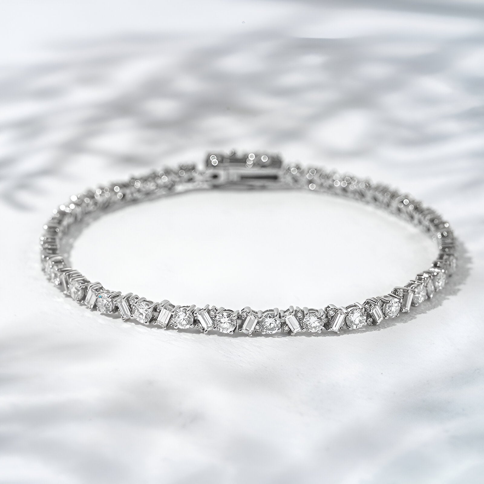 Diamond bracelet on a textured white background