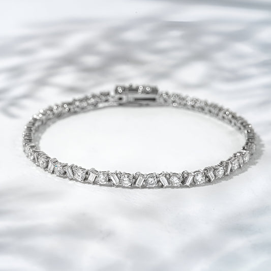 Diamond bracelet on a textured white background