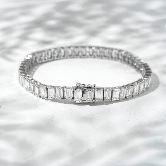 Diamond bracelet on a textured white surface