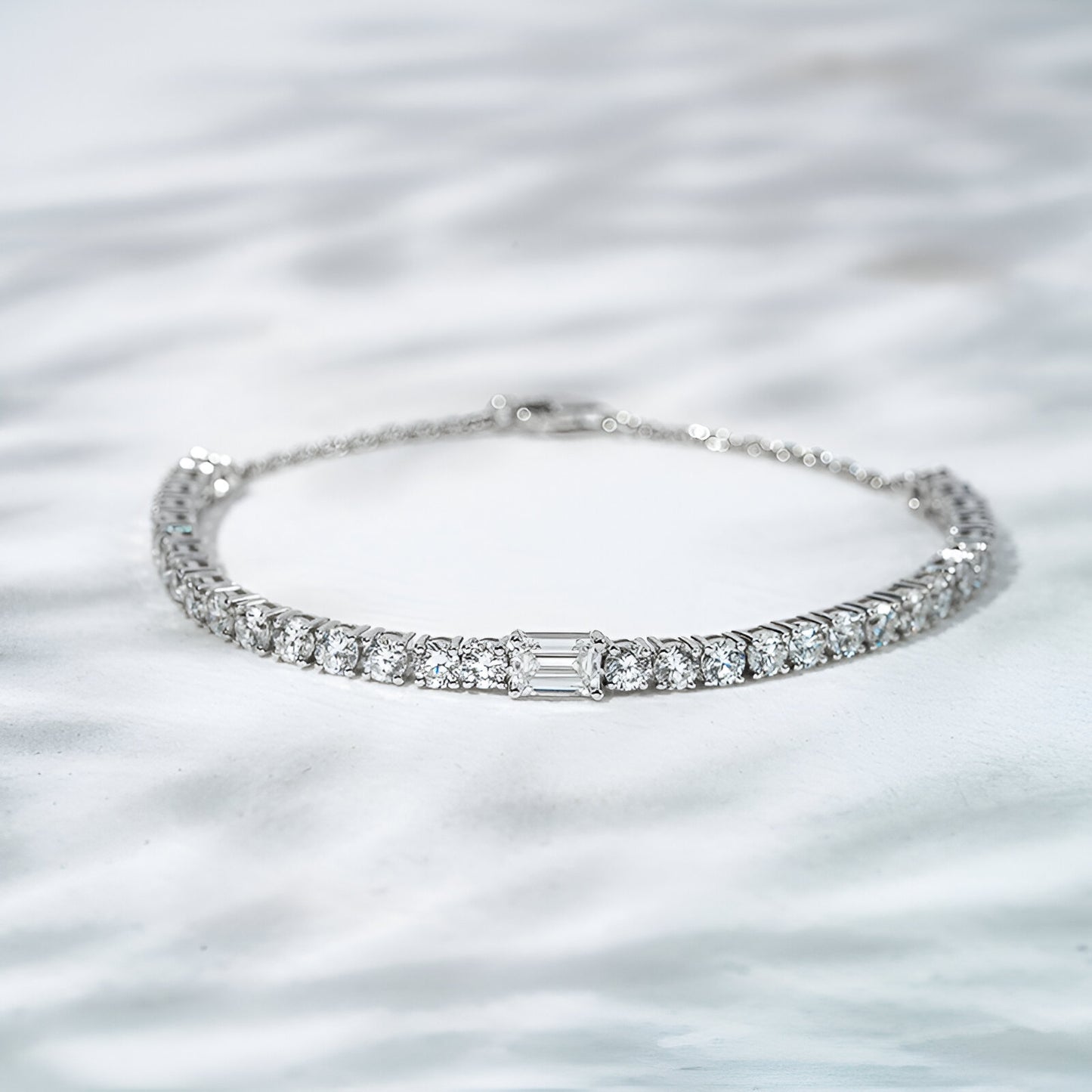 Silver bracelet with diamonds on a white background