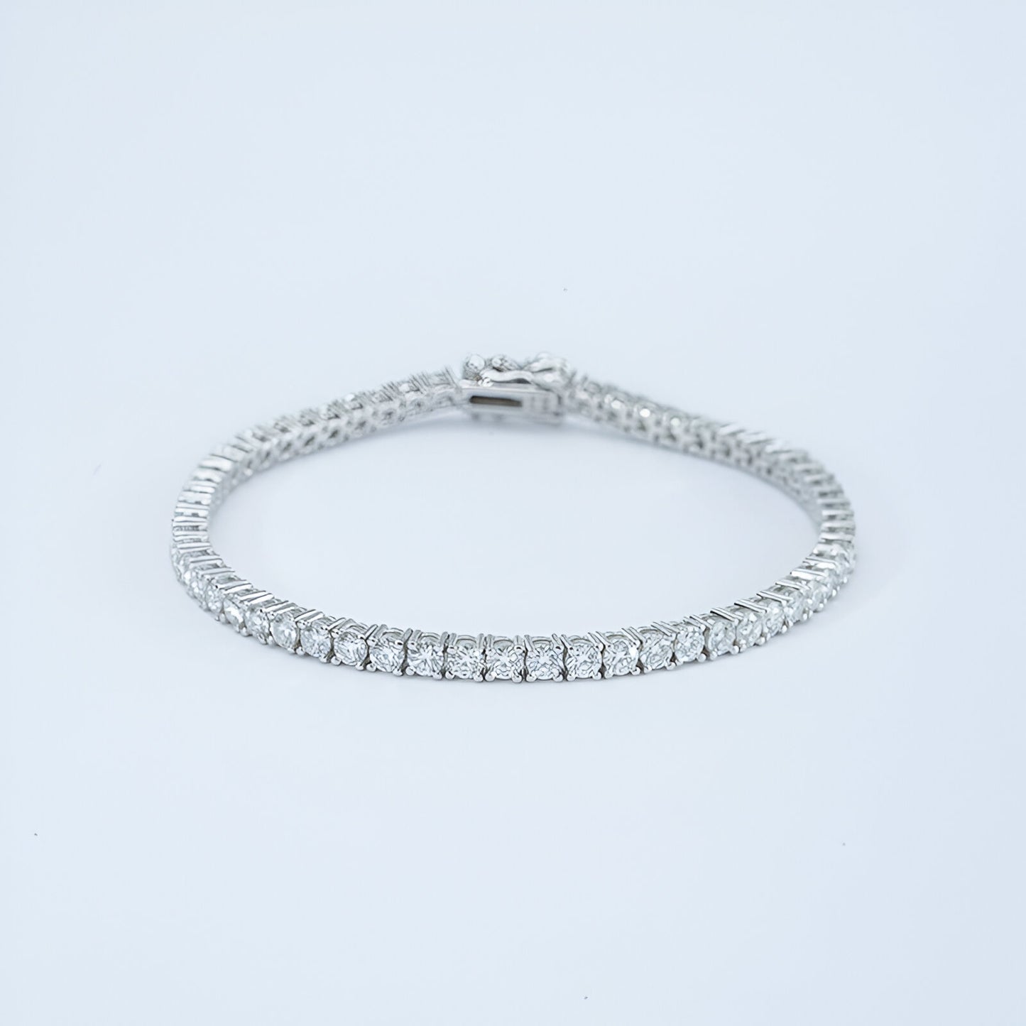 Diamond bracelet on a light gray background