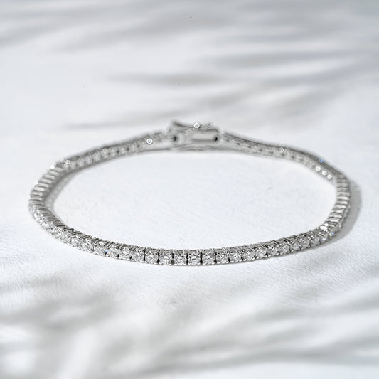 Diamond bracelet on a white fabric background
