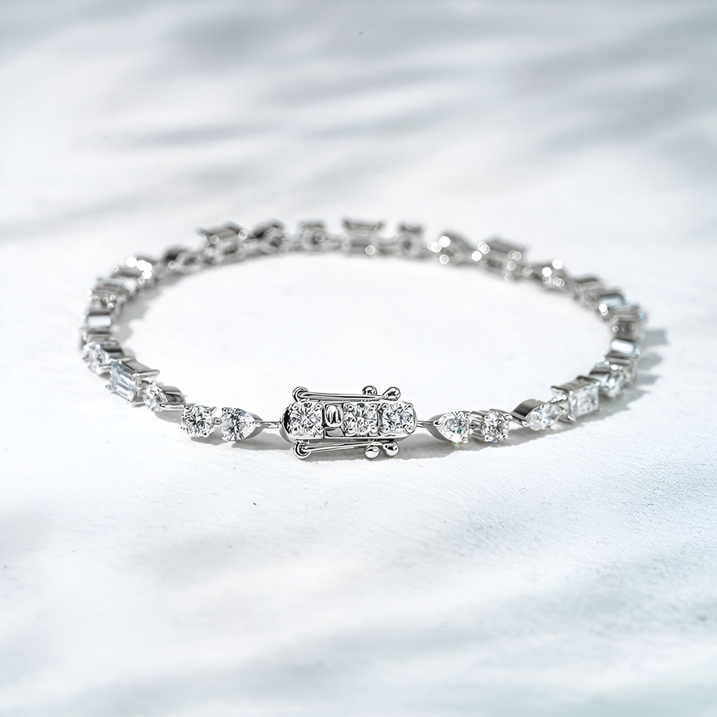 Diamond bracelet on a silver background