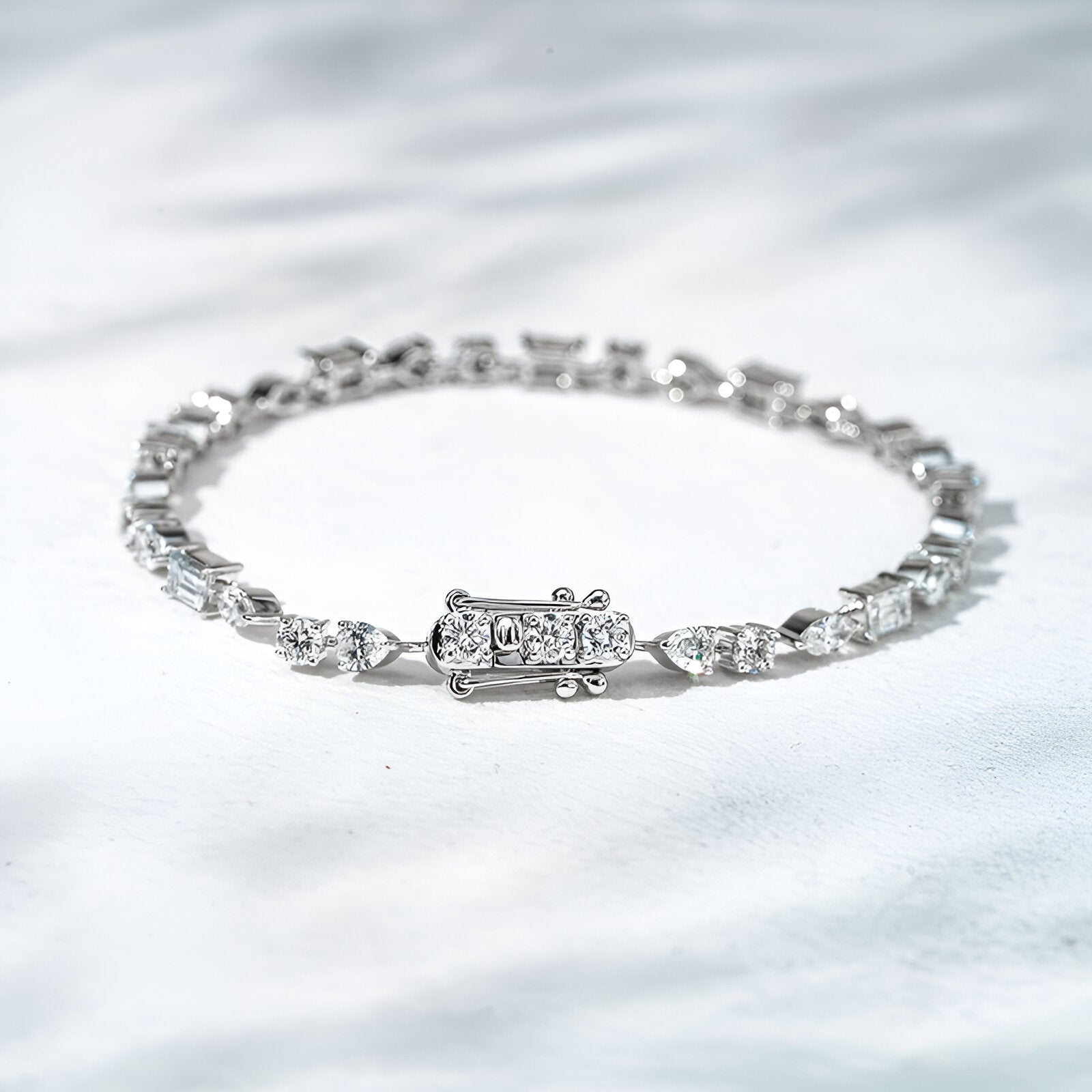 Diamond bracelet on a silver background