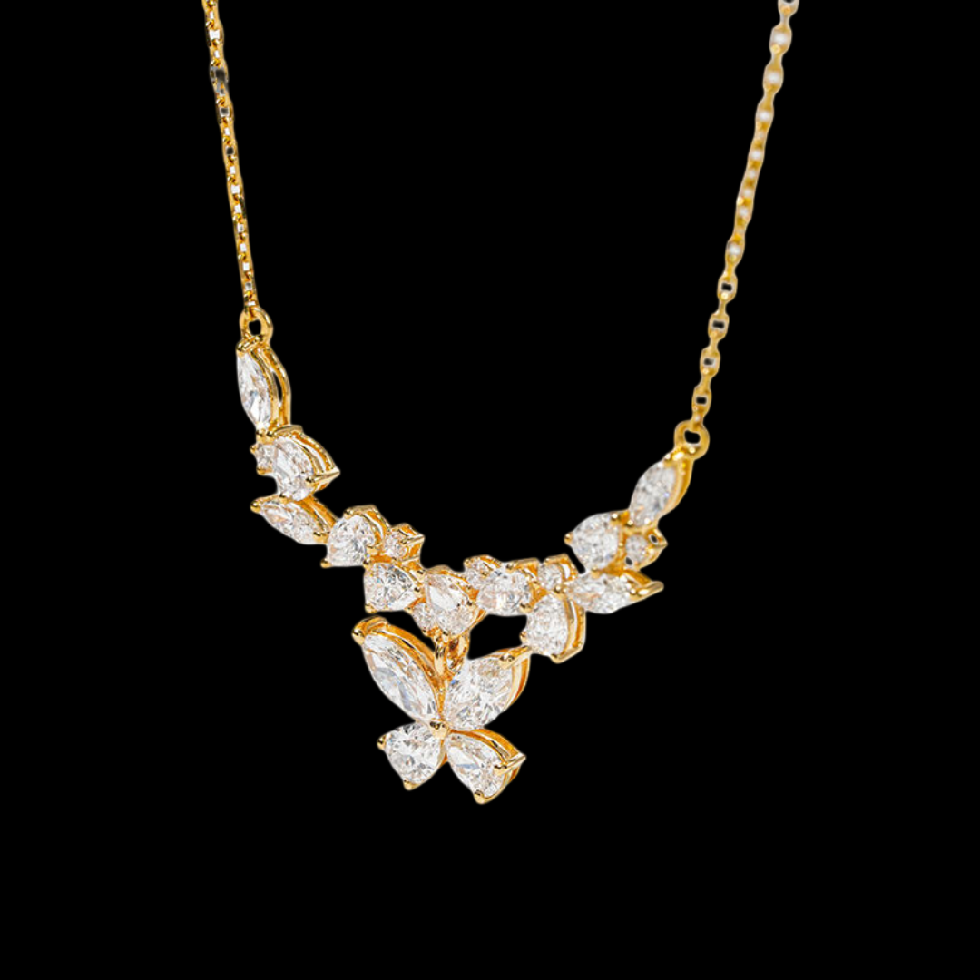 Gold necklace with diamond pendants on a black background