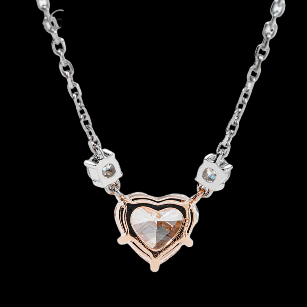 Necklace with a heart-shaped pendant on a black background