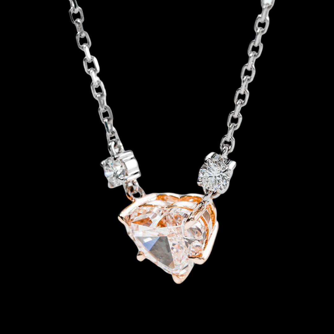 Diamond necklace with a heart-shaped pendant on a black background