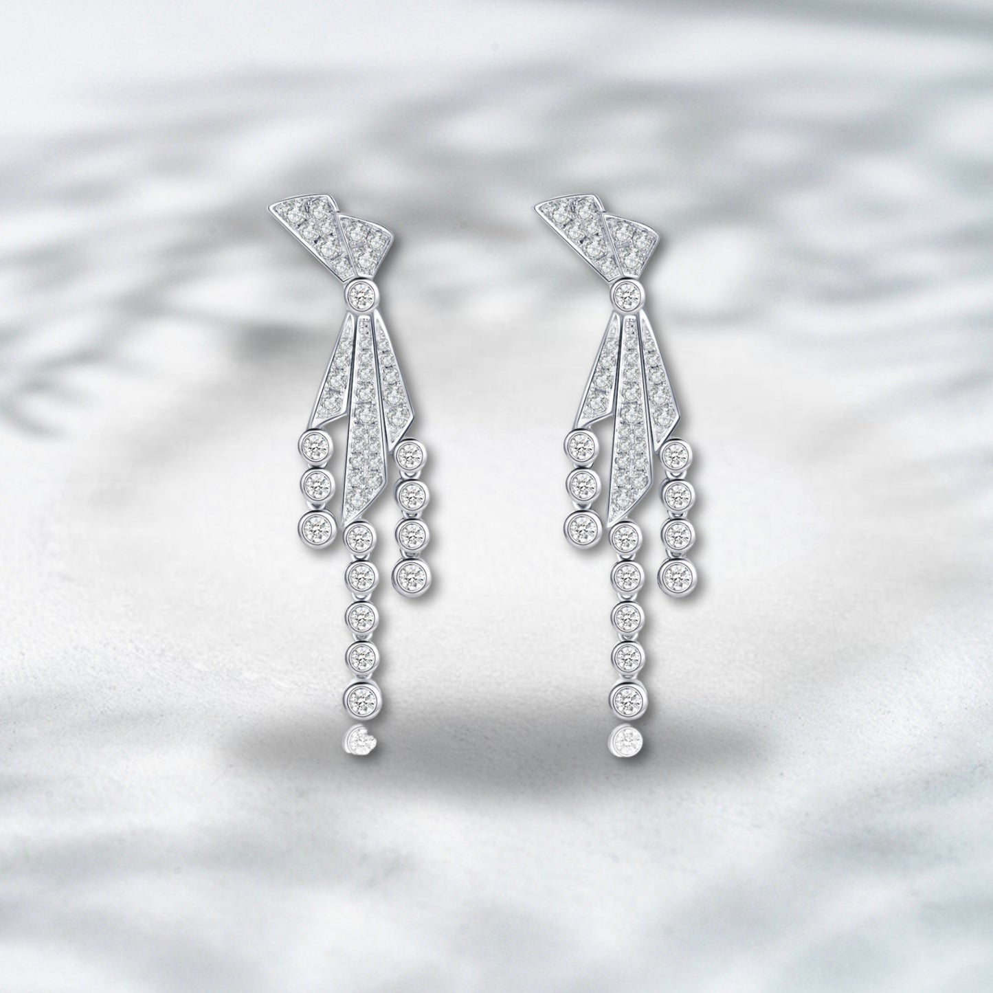 QOB Bowtie Cascade Diamond Earrings 1.20 ct total. 18K white gold