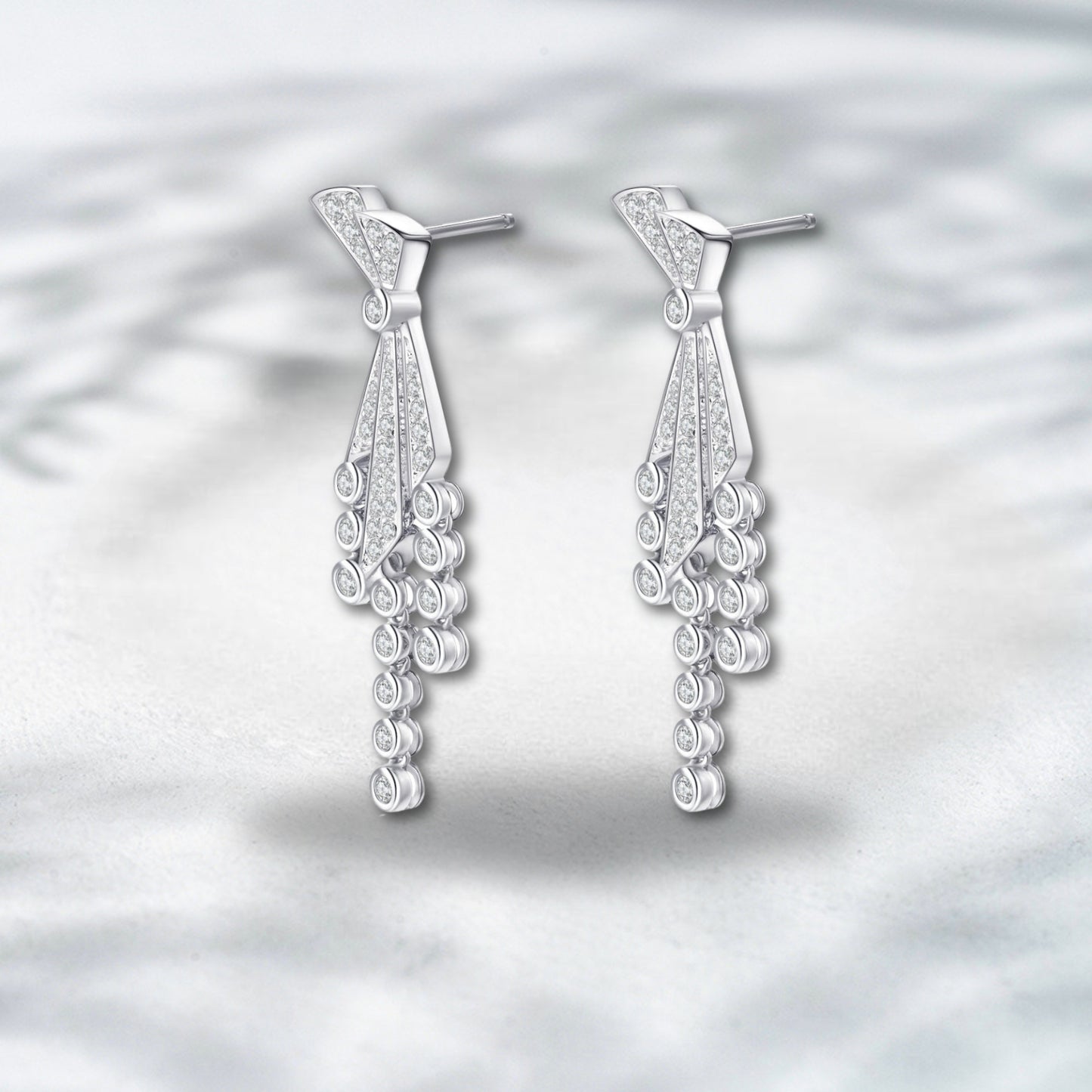 QOB Bowtie Cascade Diamond Earrings 1.20 ct total. 18K white gold