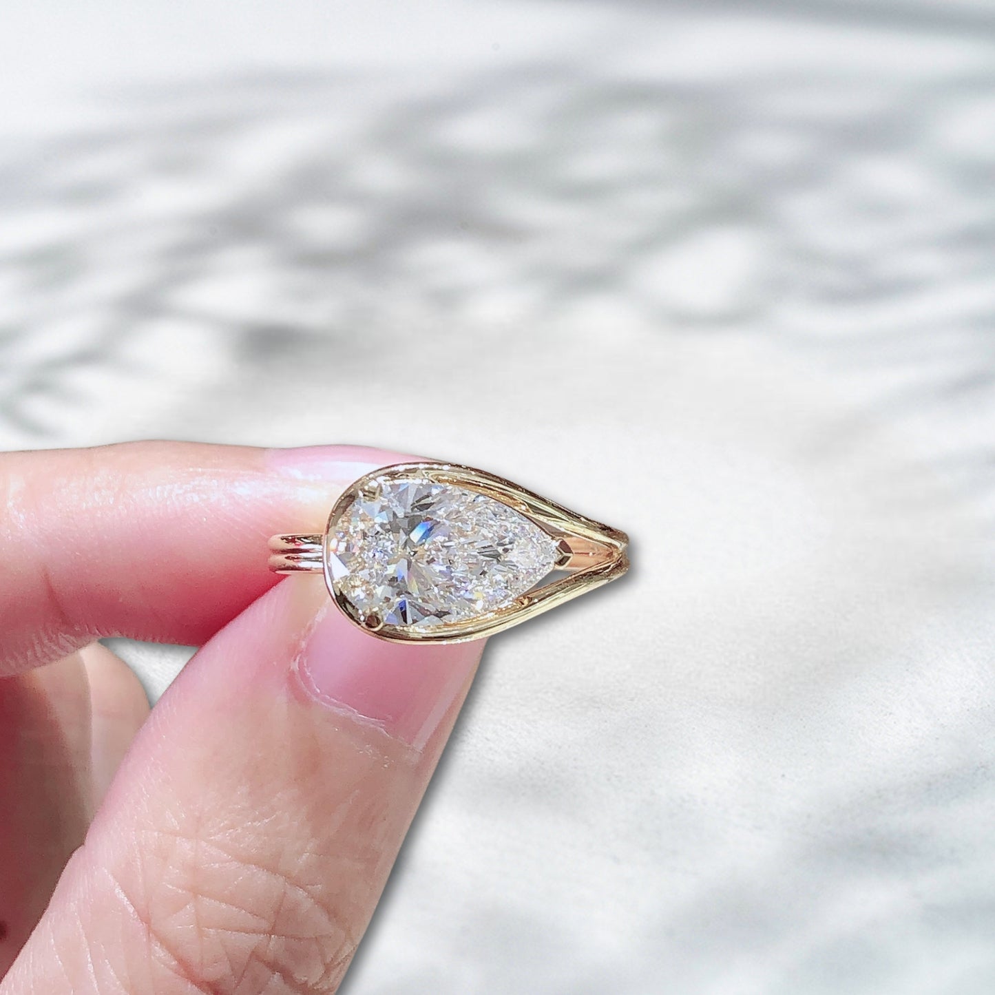 The Crowned Drop – Pear Cut Solitaire in 18K Yellow Gold