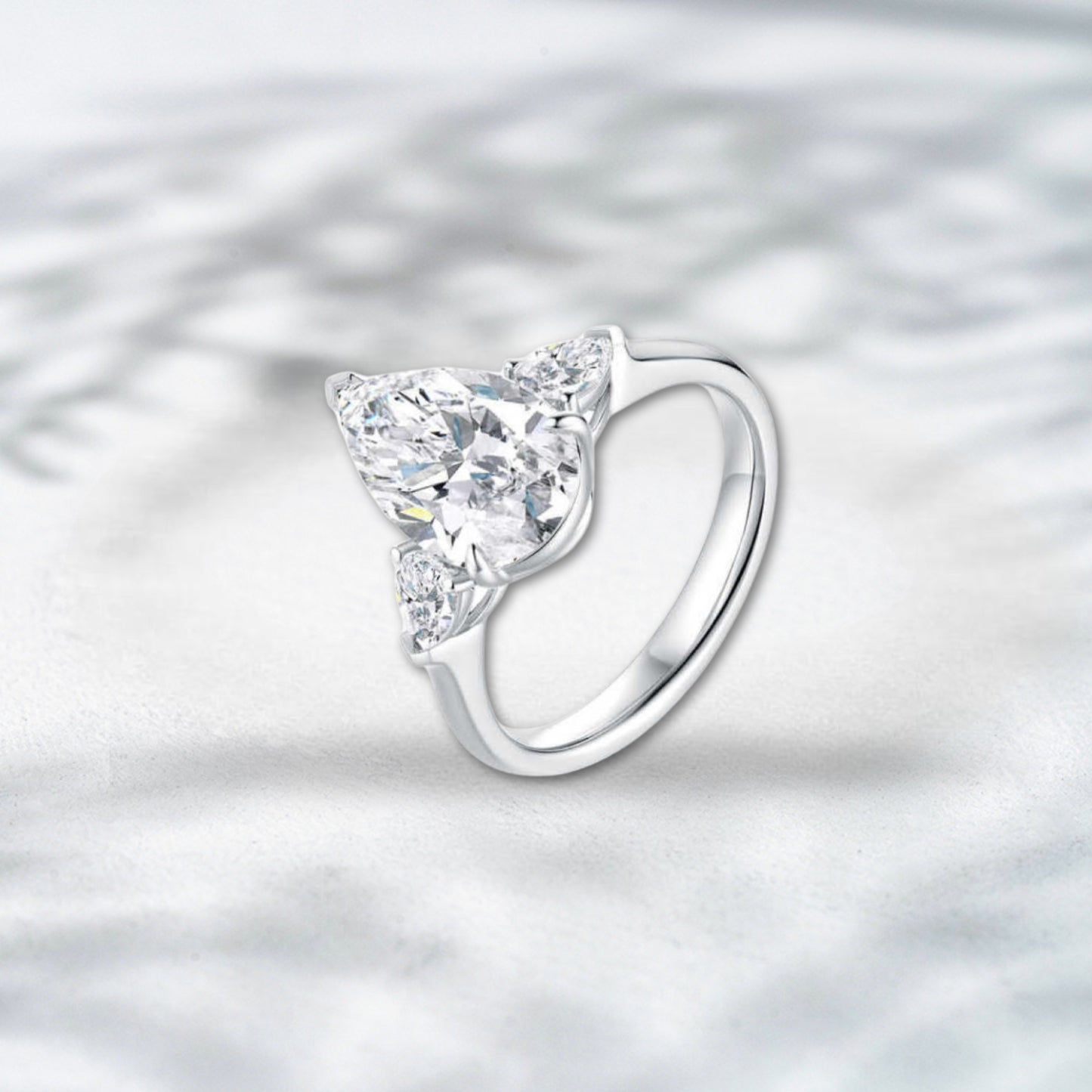 QOB Celestique Bloom – 3.1ct Pear Trio Lab Diamond Ring in Platinum PT950