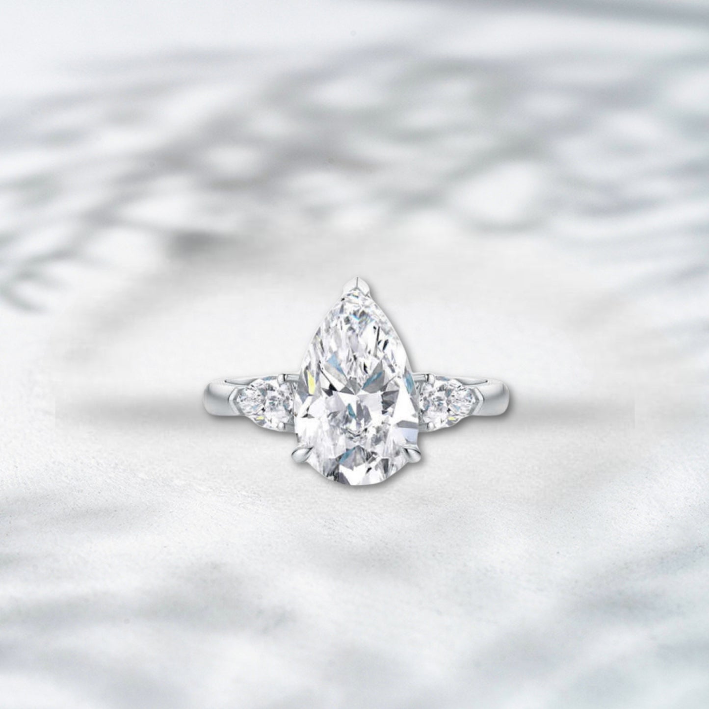 QOB Celestique Bloom – 3.1ct Pear Trio Lab Diamond Ring in Platinum PT950