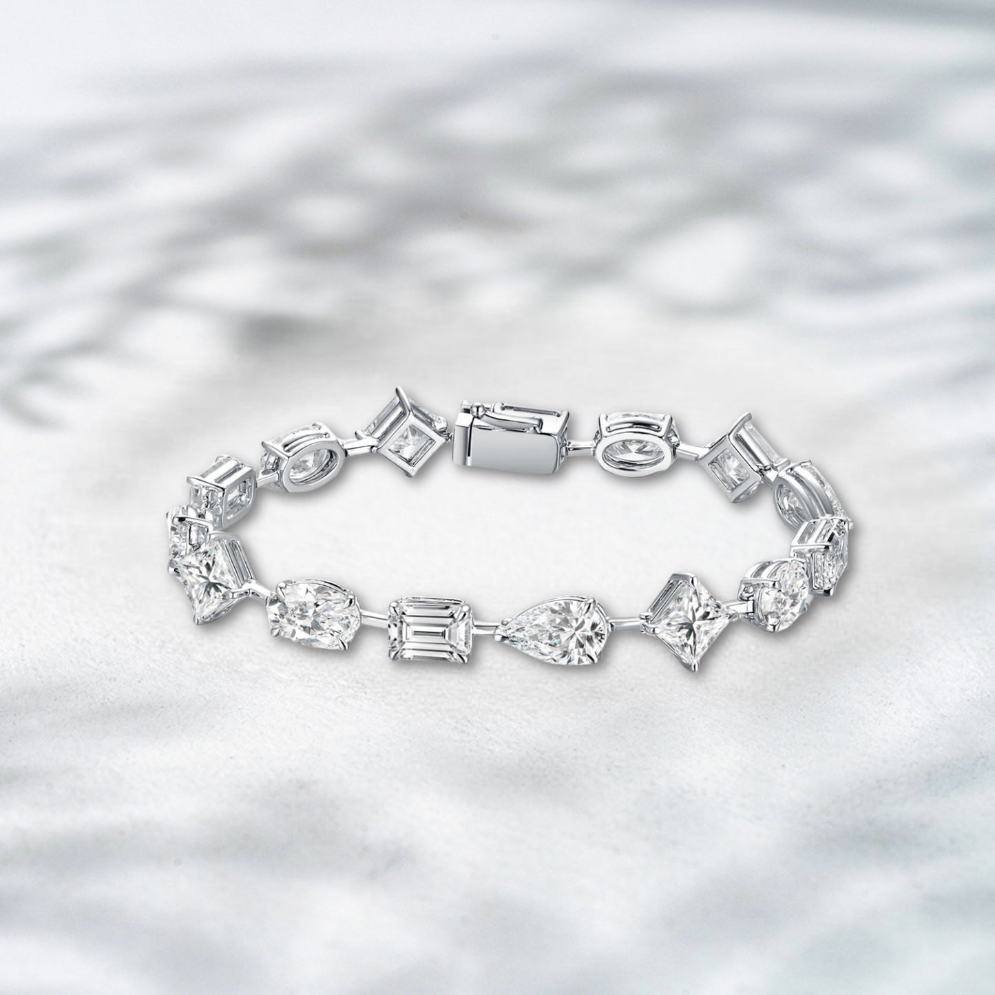 Diamond bracelet on a textured white background
