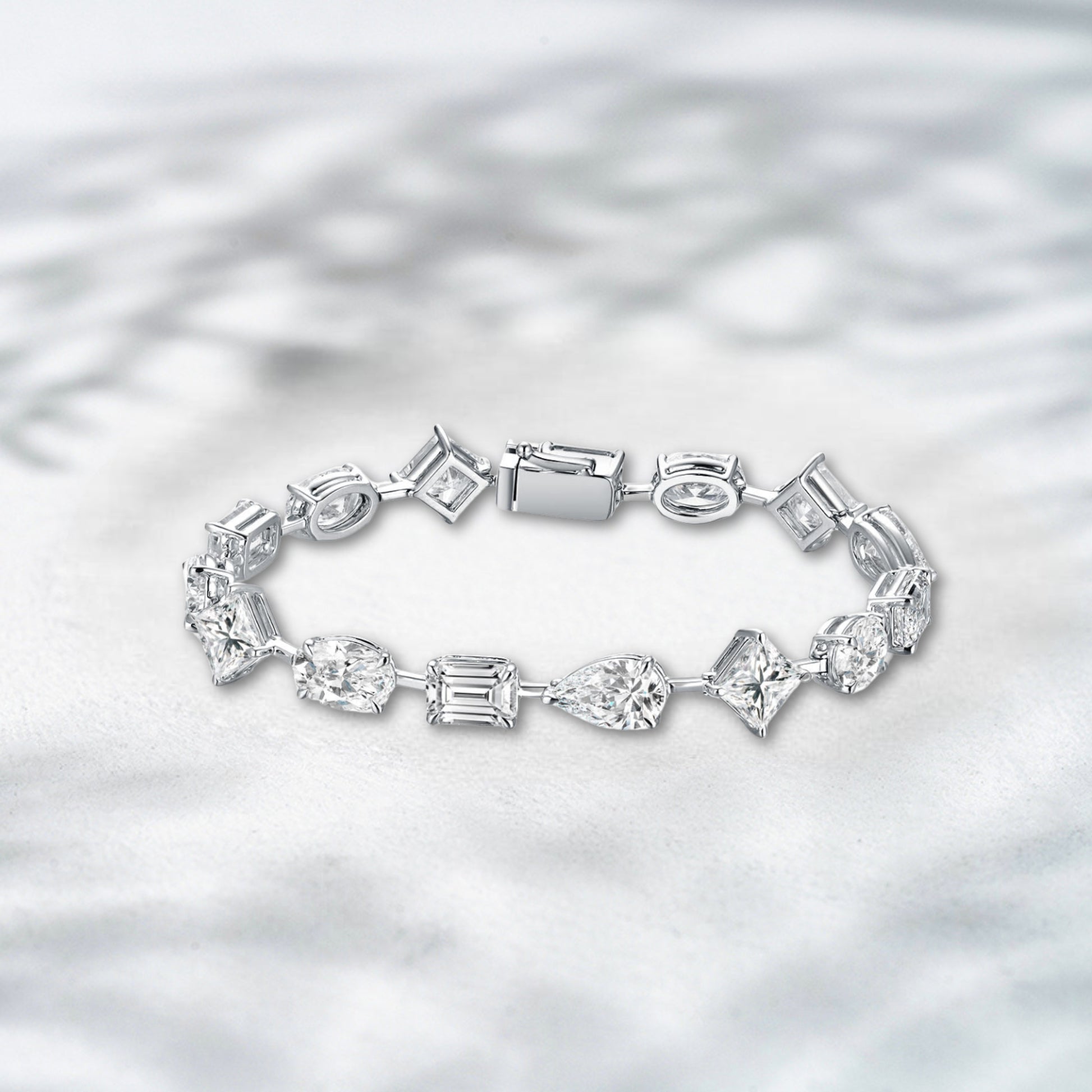 Diamond bracelet on a textured white background