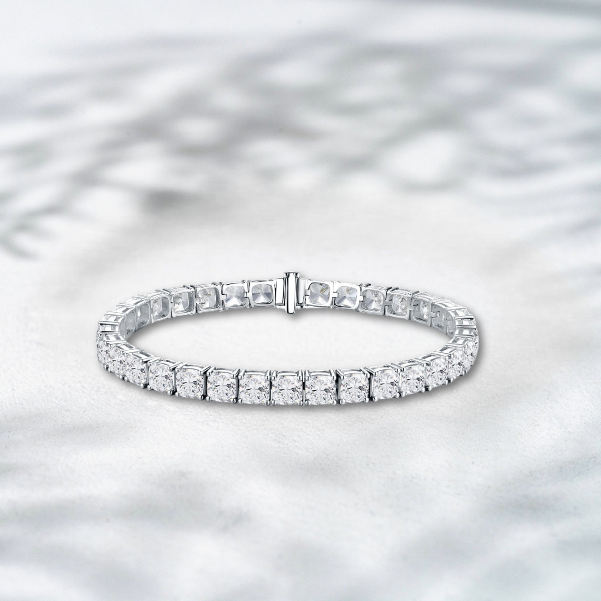 Diamond bracelet on a light gray background