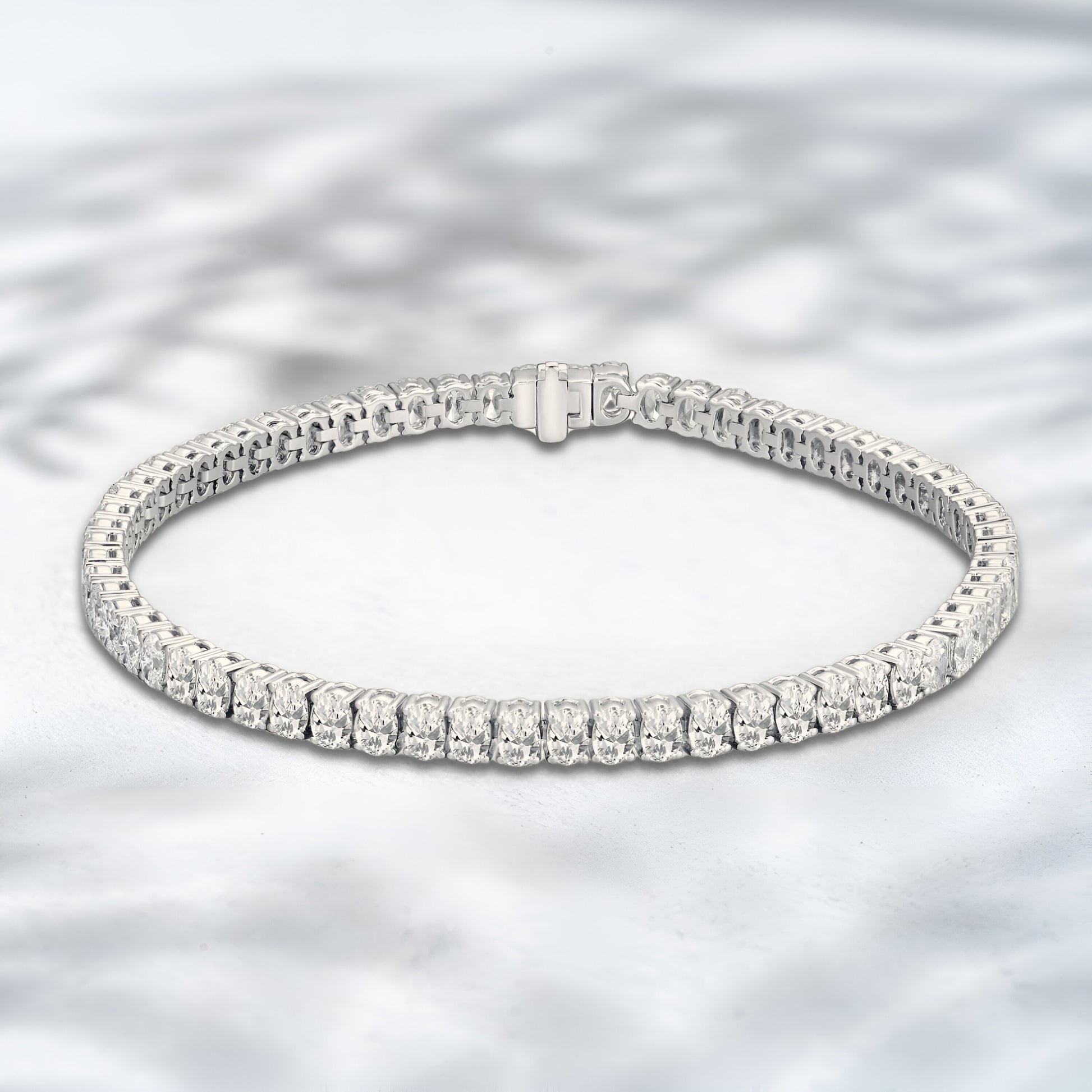 Diamond bracelet on a light gray background