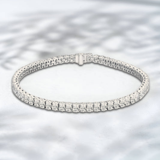 Diamond bracelet on a light gray background